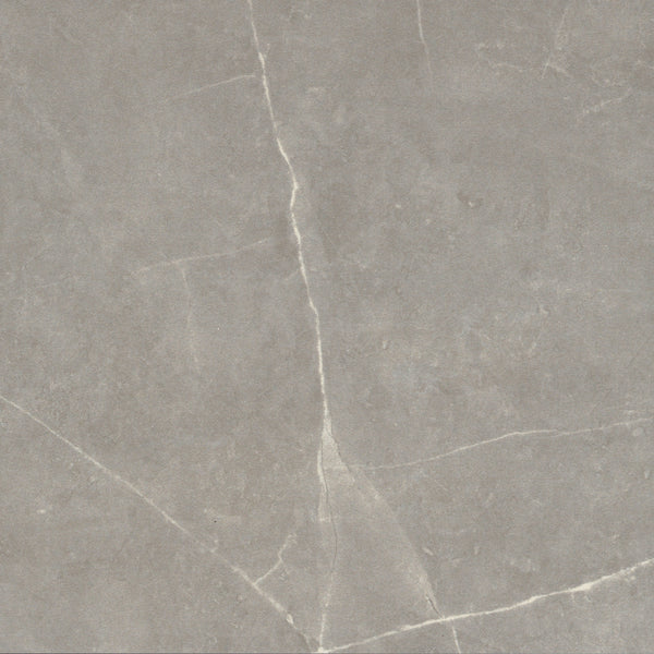 A close-up of the Callie 12x12 Ceramic Tile in Fog, featuring white veins—perfect for designing a luxurious checkerboard pattern.