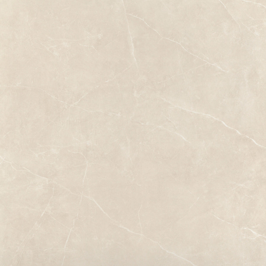 The Callie 24x24 Polished Porcelain Tile in Alabaster features a light beige marble look with subtle white veins and a sleek, polished finish for an elegant, minimalist style.