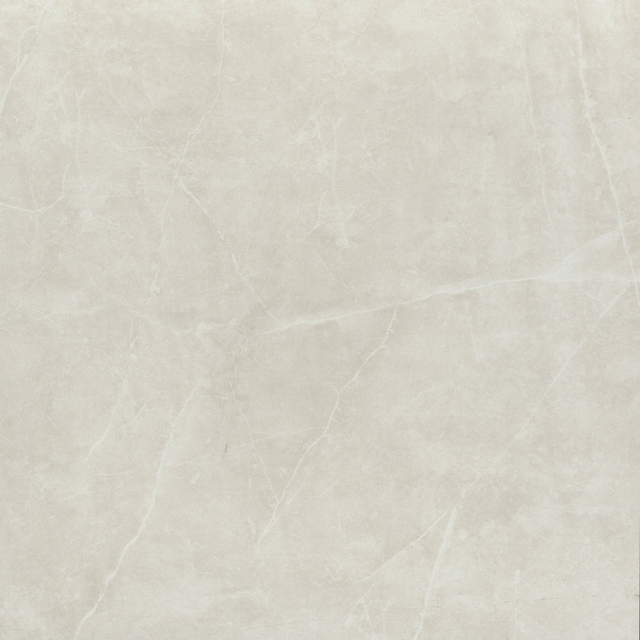 The Callie 24x24 Polished Porcelain Tile in Steel features a smooth, polished finish with subtle white and gray veining, capturing the refined luxury and natural stone look of high-end ceramic tiles.