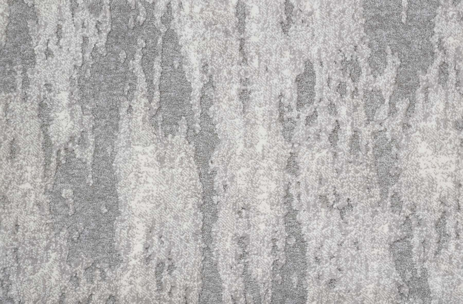 Close-up of Arabella On Trend Carpet in Sterling, showcasing a textured gray and white surface with an irregular, mottled pattern reminiscent of elegant natural stone.