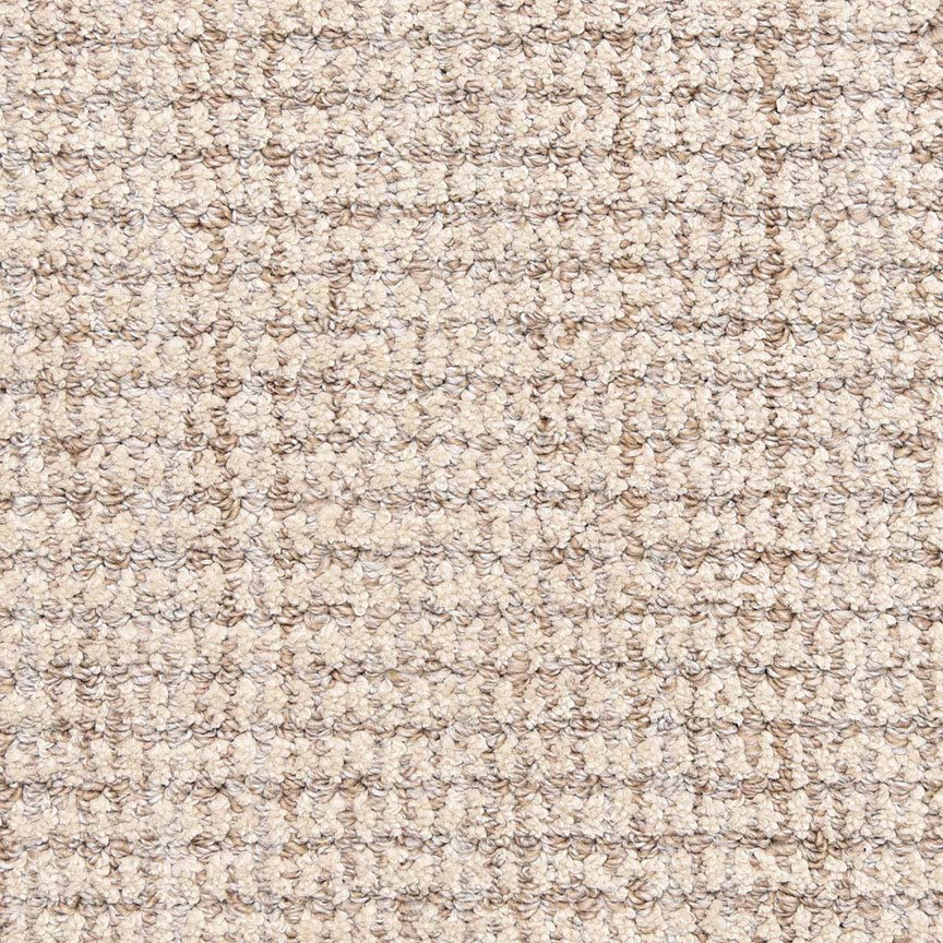 Close-up of Aspen Berber Carpet in Stone, featuring a tightly packed looped, woven texture. Its soft, uniform surface showcases the carpet’s durable construction and stylish berber design.