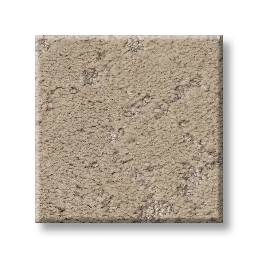 A close-up of Sincere Focus On Trend Carpet, featuring a square beige sample with a textured loop and cut pile. Subtle thread color variations create a softly mottled look.