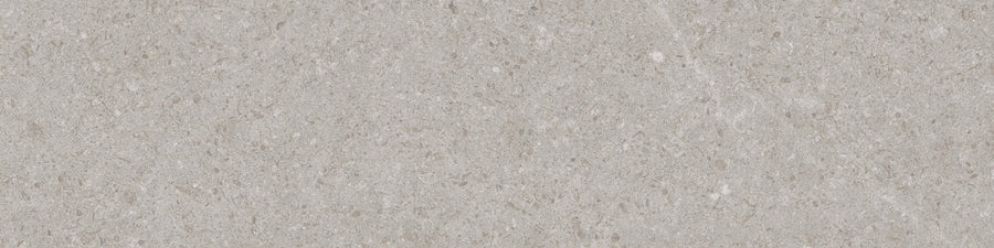 A close-up of the Stripes LISO XL Stone Ceramic Tile in greige shows a smooth surface with subtle speckles and natural patterns resembling concrete or marble, evenly distributed for a refined look.