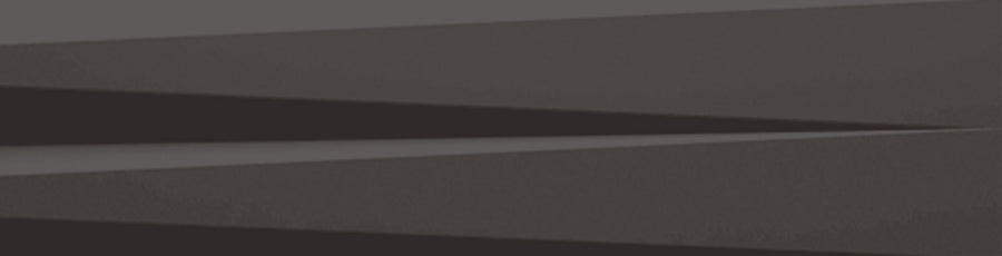 Abstract image featuring overlapping, sharply angled Graphite Matte shapes with a folded, geometric look and pronounced shadows, showcasing the subtle striped pattern of Stripes 3" x 12" Transitional Ceramic Tile.