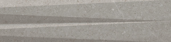 Sharp, triangular shadows cast across a textured gray surface create a geometric striped pattern reminiscent of Stripes 3