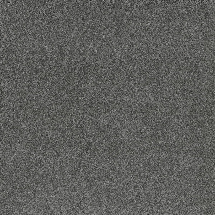 Close-up of Stunning Family Friendly Carpet in Zinc—a gray, textured, stain-resistant carpet with a soft, mottled surface and dense fibers, making it an ideal family-friendly flooring choice.
