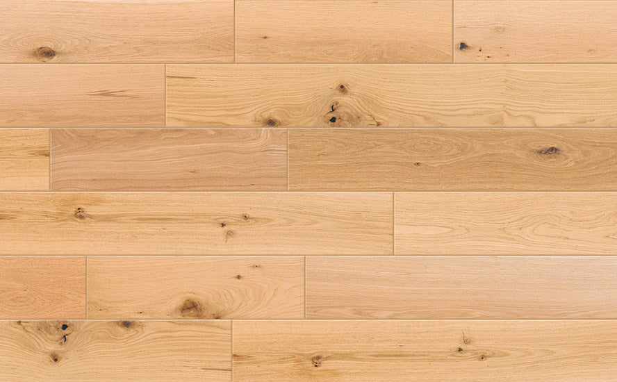 Valor Hall 7 1/2" White Oak Hardwood flooring features light European oak planks with natural grain, knots, and subtle shade variations in a staggered pattern, adding rustic elegance to any space.