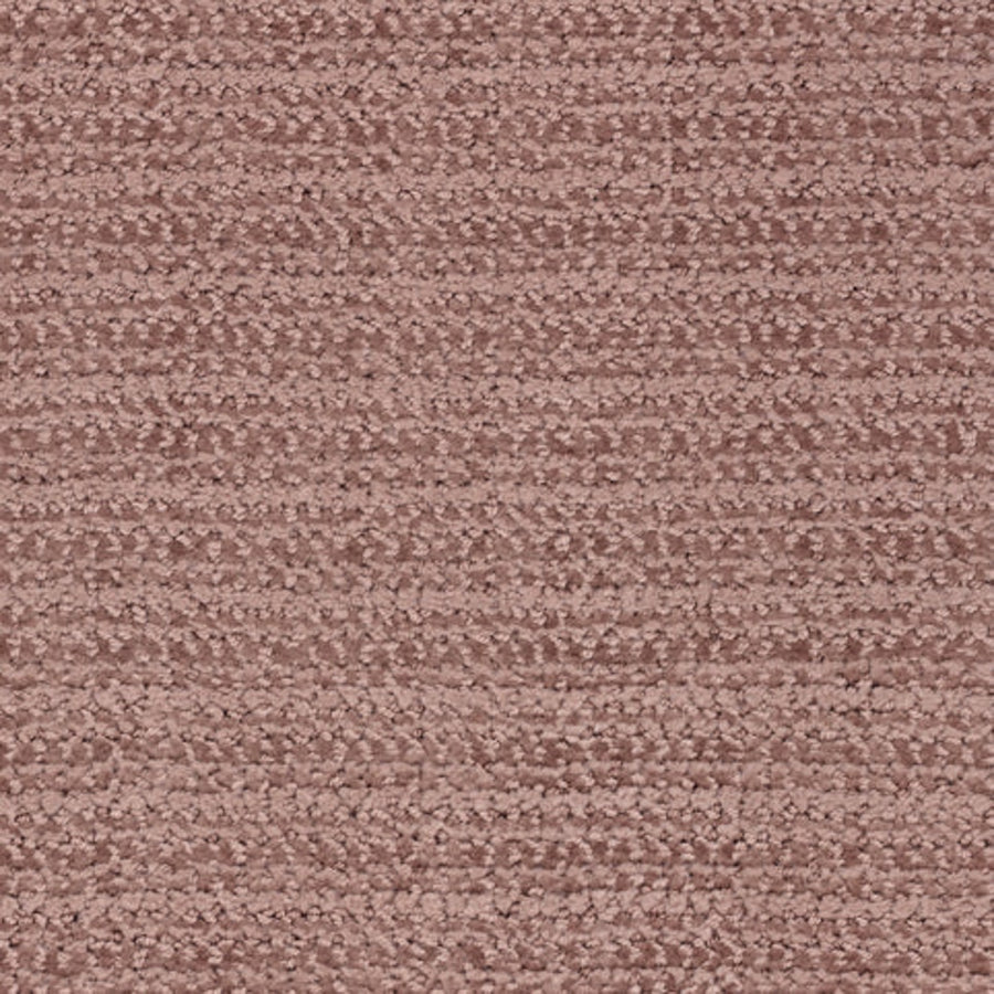 Close-up of Beguiling Berber Carpet in Sunset, highlighting its tightly looped texture and horizontal lines. The soft, plush material offers a luxurious look ideal for premium flooring.