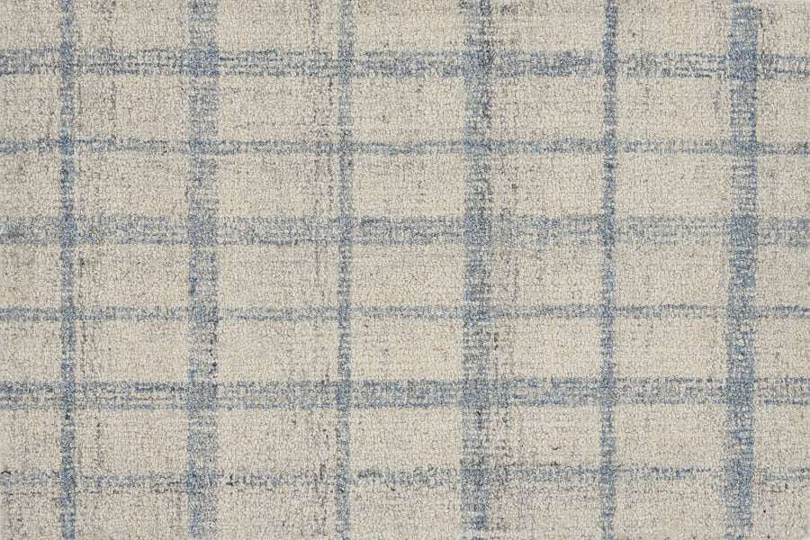 The Tartan Tones On Trend Carpet in Horizon features a grid of intersecting light blue lines on an off-white base, inspired by Scottish patterns. Slightly irregular lines create a textured, soft, and woven look.