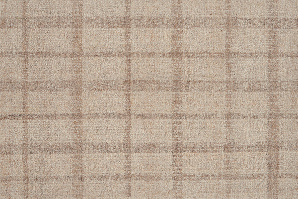 Close-up of the Tartan Tones On Trend Carpet in Oatmeal, showcasing a beige and light brown plaid with intersecting lines reminiscent of classic Scottish tartan patterns.