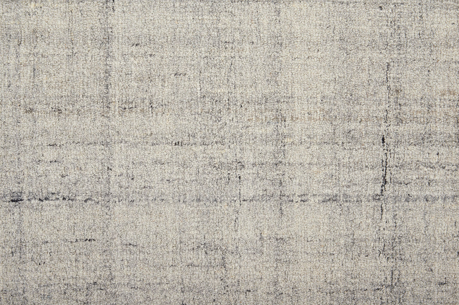 A close-up of Terrain On Trend Carpet in Mountain shows its textured, light gray surface with subtle dark lines in a loose grid pattern—ideal for contemporary, durable flooring in commercial spaces.
