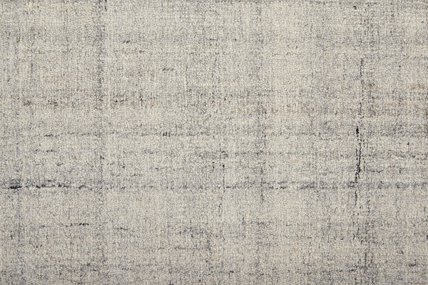 A close-up of Terrain On Trend Carpet in Mountain shows its textured, light gray surface with subtle dark lines in a loose grid pattern—ideal for contemporary, durable flooring in commercial spaces.