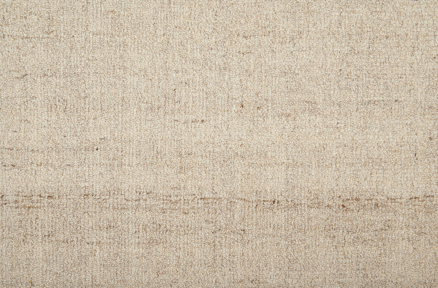 Close-up of Terrain On Trend Carpet in Plains color, featuring a beige, textured surface with a subtle woven pattern and horizontal lines—perfect for modern spaces seeking a natural, neutral look inspired by commercial flooring.