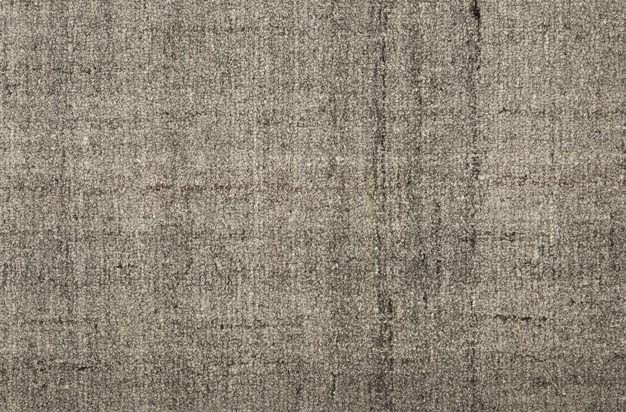 Close-up of Terrain On Trend Carpet in Ravine, featuring a beige and gray textured surface with a subtle woven pattern and vertical lines—perfect for contemporary commercial flooring applications.