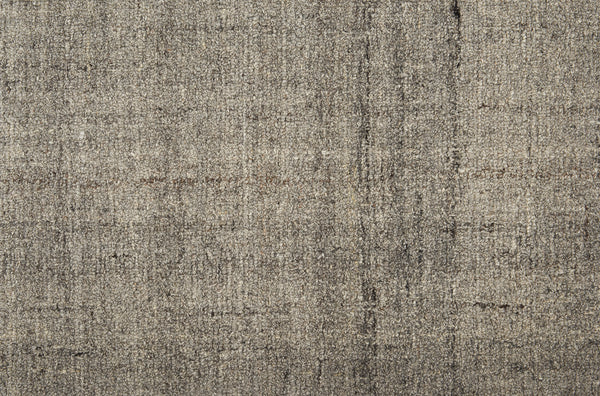 Close-up of Terrain On Trend Carpet in Ravine, featuring a beige and gray textured surface with a subtle woven pattern and vertical lines—perfect for contemporary commercial flooring applications.