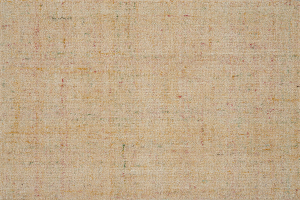 Close-up of Terrain On Trend Carpet in Straw—textured beige with faint lines and scattered yellow, red, and green specks. Its subtly rough, woven look offers durable commercial flooring with modern style and added visual interest.