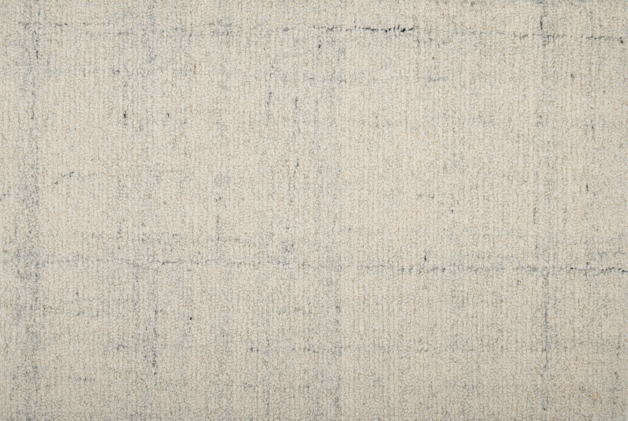 Close-up of Terrain On Trend Carpet in Tundra: a beige, textured surface with a subtle gray grid pattern. Its soft, durable fibers make it ideal for contemporary commercial flooring applications.