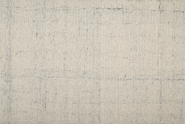 Close-up of Terrain On Trend Carpet in Tundra: a beige, textured surface with a subtle gray grid pattern. Its soft, durable fibers make it ideal for contemporary commercial flooring applications.