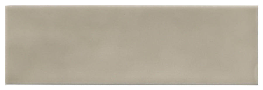The Zephyr 2.5x8 Ceramic Tile is a rectangular, light gray Mediterranean ceramic tile with a smooth, glossy finish and subtle shading, shown against a white background. Special-order available.