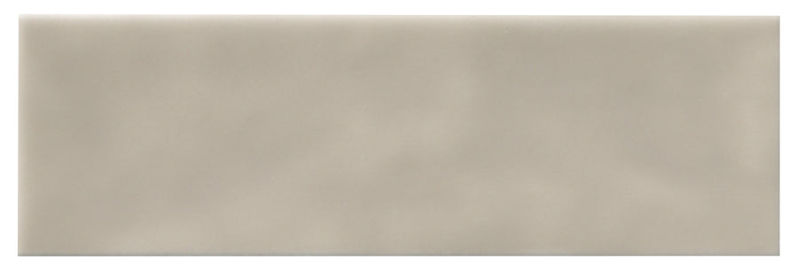 The Zephyr 2.5x8 Ceramic Tile features a smooth, matte surface in light grayish-beige with subtle Mediterranean-inspired shading and an even texture for a refined look.