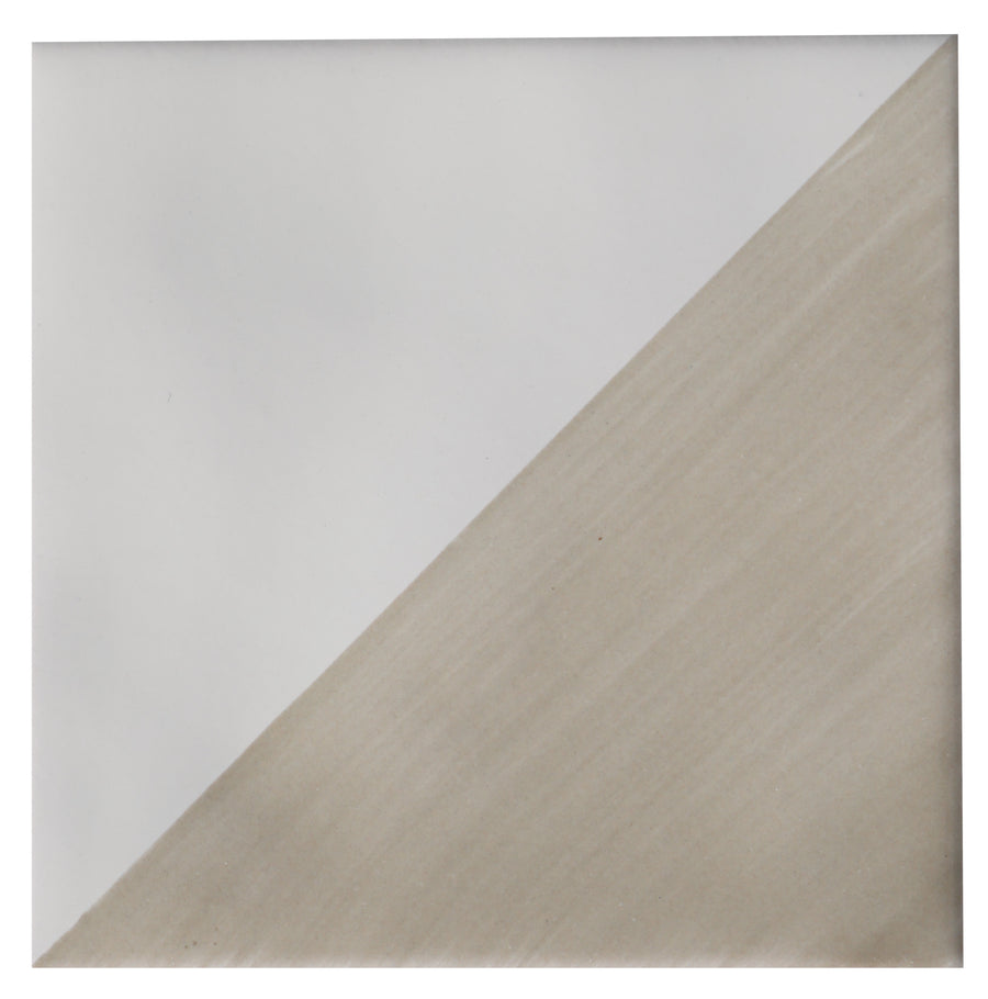 The Zephyr 4x4 Compass Deco Ceramic Tile features a diagonally split design: the upper left is solid white, while the lower right is a textured light beige with subtle horizontal streaks, evoking handcrafted luxury.