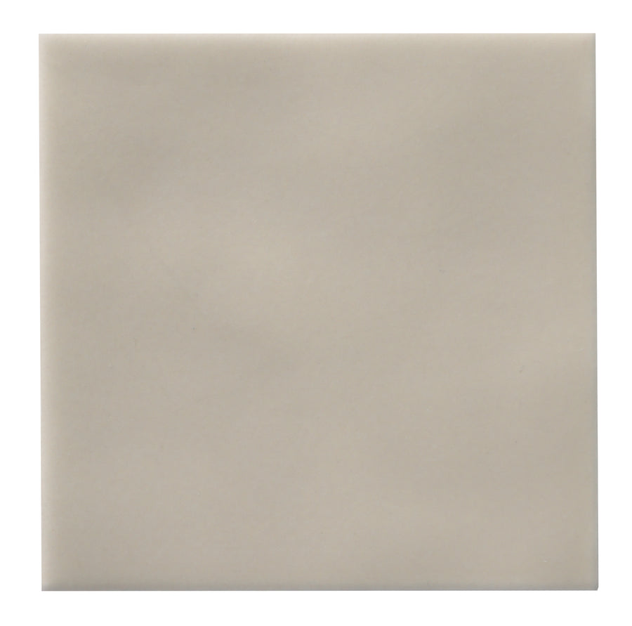 The Zephyr 4x4 Ceramic Tile is a plain, smooth, light beige Mediterranean tile with no visible patterns or textures, set against a white background. Special-order available.