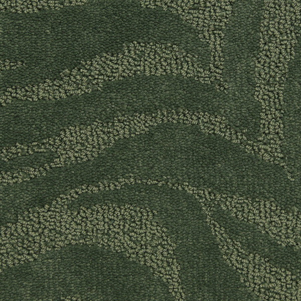A close-up of Capetown On Trend Carpet in Table Mtn shows its textured looped and tufted fibers with an abstract wavy green pattern, creating a durable, organic design ideal for high-traffic spaces.