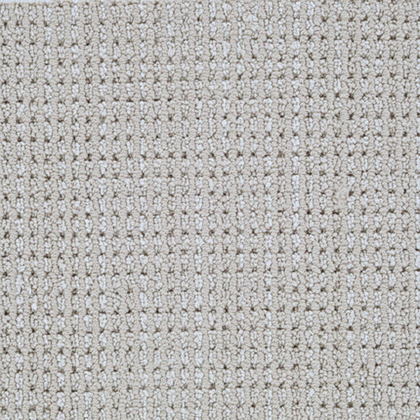 A close-up of Top Notch Berber Carpet in Taupe Haze, featuring a textured, grid-like looped pattern with small raised squares—an excellent option for premium, stain-resistant flooring.