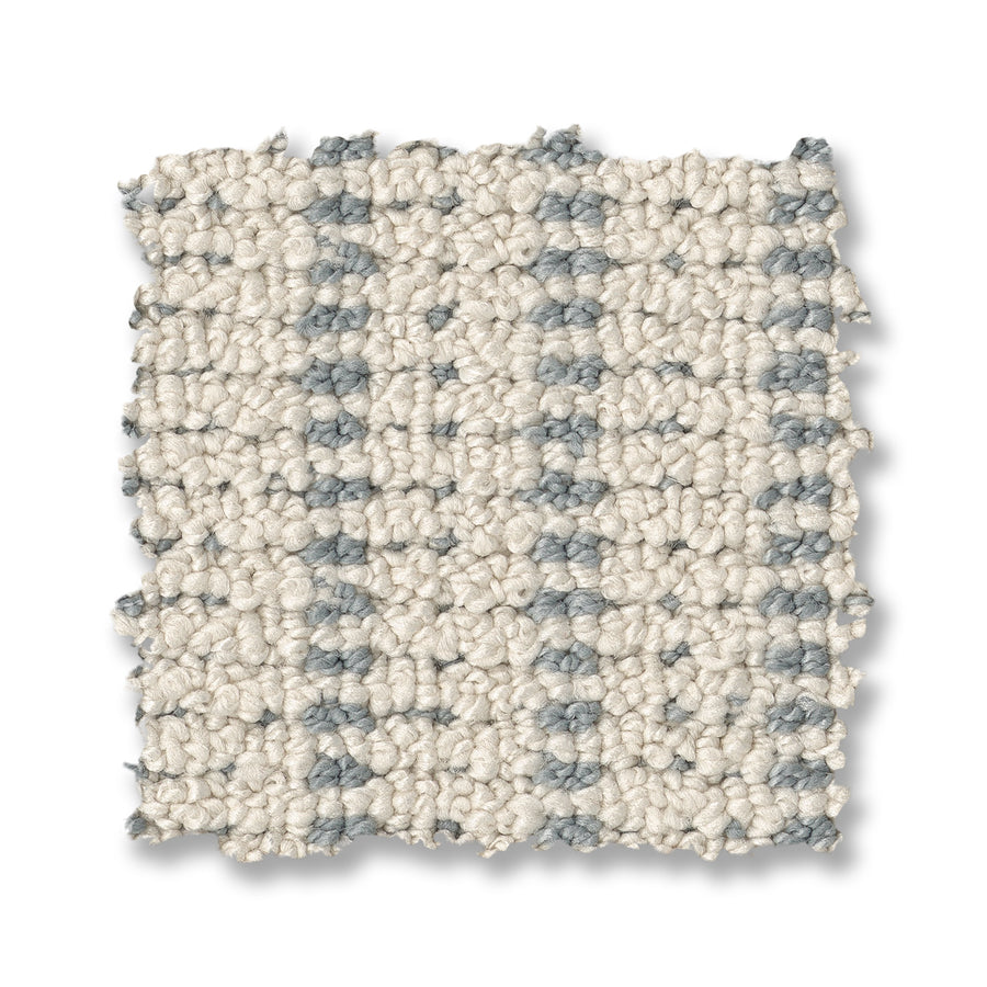 A square swatch of Laken On Trend Carpet with a looped pile features alternating off-white and light gray vertical stripes, and its edges are slightly frayed.