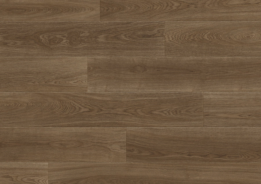 Close-up of Aura Modern Waterproof Laminate in Tiger's Eye color, featuring a natural wood grain pattern and staggered layout. The smooth, polished surface displays varied brown shades for a modern flooring look.