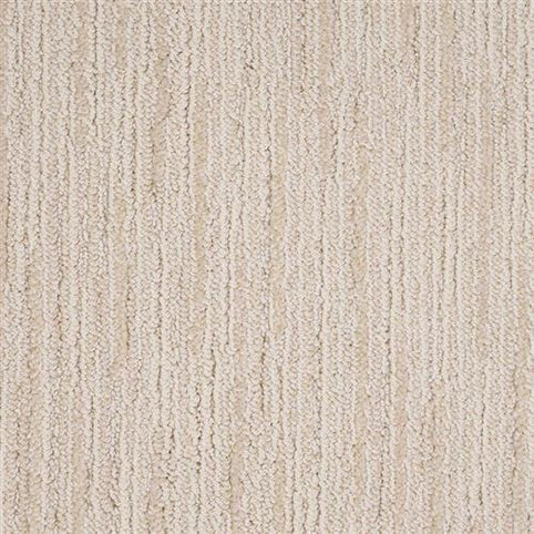 Close-up of the Artist View On Trend Carpet in Titanium Buff, featuring vertical, slightly raised lines and a plush texture. Its subtle uniform pattern adds warmth and style, making it an ideal choice for cozy, modern interiors.