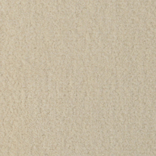 Close-up of Seduction On Trend Carpet in Touch Of Tan—a beige, luxury carpet featuring soft, slightly fuzzy, densely packed fibers and a uniform color for elegant, durable flooring suitable for any space.