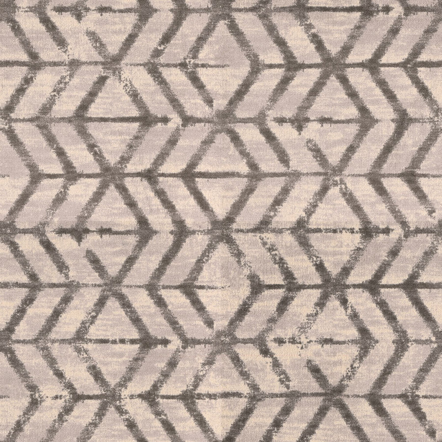 Featuring interlocking hexagons in dark gray on a light beige background, the Traveler's Path On Trend Carpet offers a distressed, textured look for a premium feel.