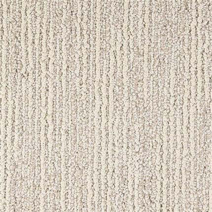 Close-up of Advocate Berber Carpet in Treasure, showcasing a textured looped pile with subtle vertical lines. The uniform color and premium weave offer a soft, durable look perfect for home or office interiors.