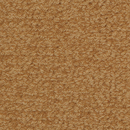 Close-up of Savant Berber Carpet in Trehin, showcasing its textured loop-pile and tightly woven fibers. The warm, golden-brown shade offers a soft yet durable surface, making it perfect for high-traffic spaces.