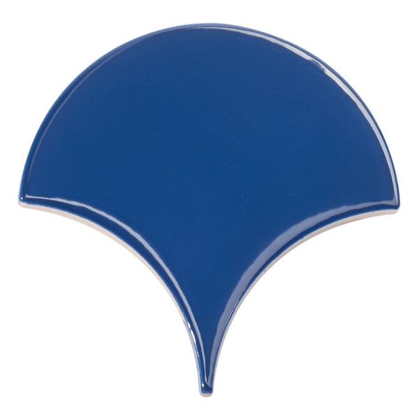 The Tidal 2x5 Ceramic Tile is a glossy, fan-shaped luxury tile in deep blue with smooth edges and a pointed bottom center, adding refined elegance to any space.