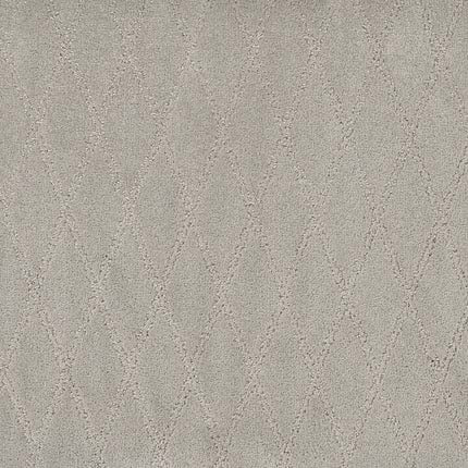 Absolute Berber Carpet in Undeniable features a light gray tone with a subtle diamond pattern from textured lines, offering a soft, elegant look that’s ideal for high-traffic areas.