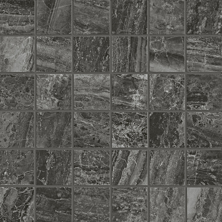 A close-up view of Cosmic 2x2 Mosaic: a grid of dark gray and black luxury marble floor tiles with natural veining and texture, arranged in a square mosaic pattern.