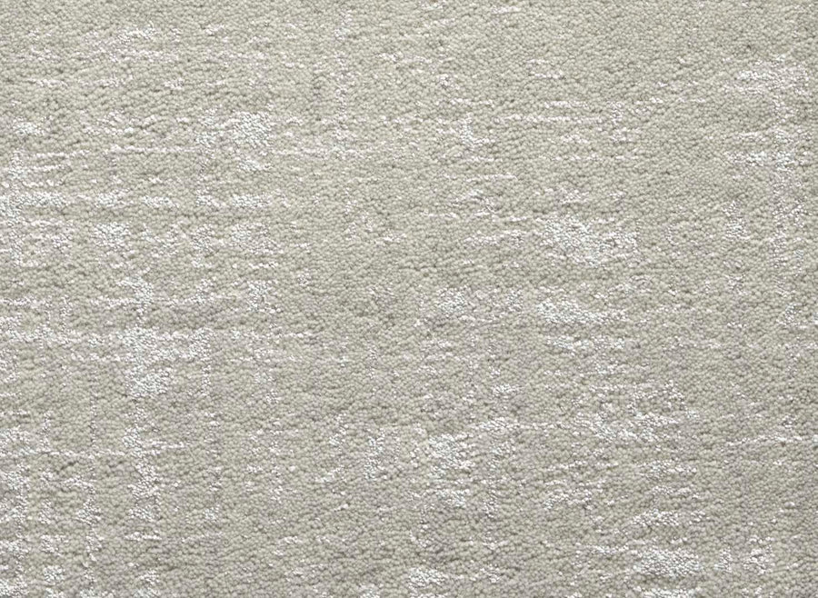 Close-up of the Velvet Abstract On Trend Carpet in Stone, featuring a soft, plush texture with gentle tonal variations and a contemporary abstract design that enhances its modern appeal.