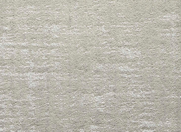 Close-up of the Velvet Abstract On Trend Carpet in Stone, featuring a soft, plush texture with gentle tonal variations and a contemporary abstract design that enhances its modern appeal.