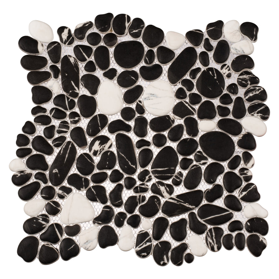 The Vista Chino 12x12 Glass Mosaic Tile in Pepper Folia features closely arranged, irregular black, white, and marbled pieces that create a textured, organic pattern with rounded shapes and curved edges.
