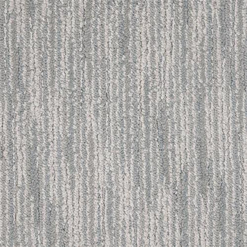 Artist View On Trend Carpet in Watercolor is a stylish, looped pile carpet with vertical, slightly irregular stripes in shades of gray and off-white—perfect for adding a modern touch to any space.