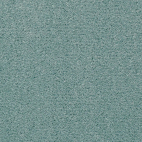 Close-up of Seduction On Trend Carpet in Waterscape color, showcasing a textured, light teal looped pile. The uniform surface offers comfort and durability, with no visible stains or markings.