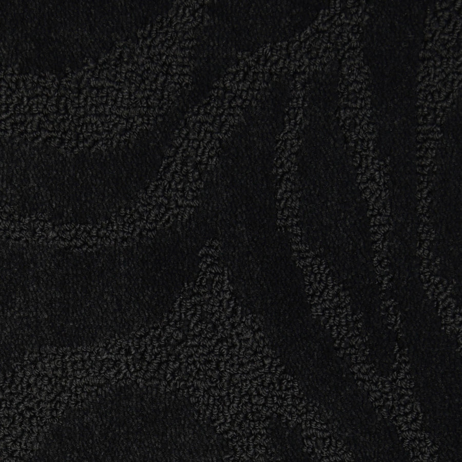 Capetown On Trend Carpet in Whales features a dark, textured fabric with subtle wavy abstract patterns. Plush and raised curves evoke luxury, while contrasting black and dark gray shades add depth to its sophisticated design.