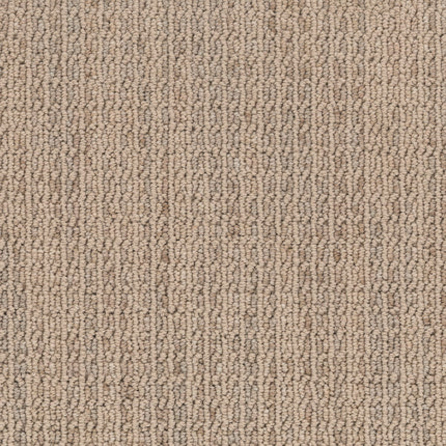 Close-up of Haven Berber Carpet in Wheat, featuring a looped pile and subtle color variations for a soft, uniform, and durable look.