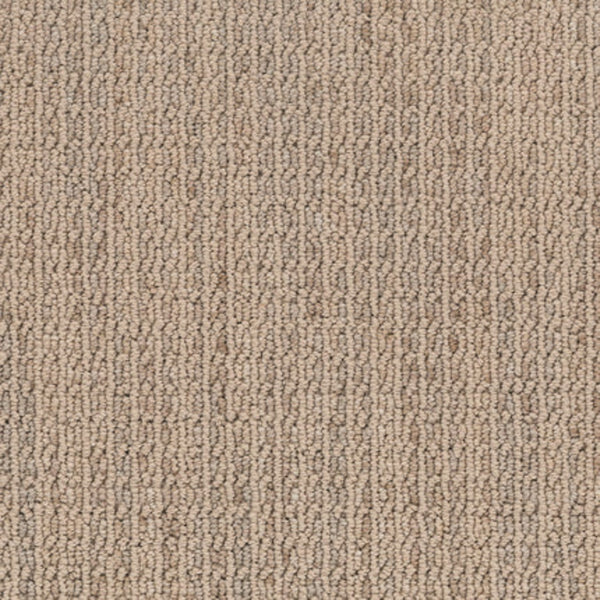 Close-up of Haven Berber Carpet in Wheat, featuring a looped pile and subtle color variations for a soft, uniform, and durable look.