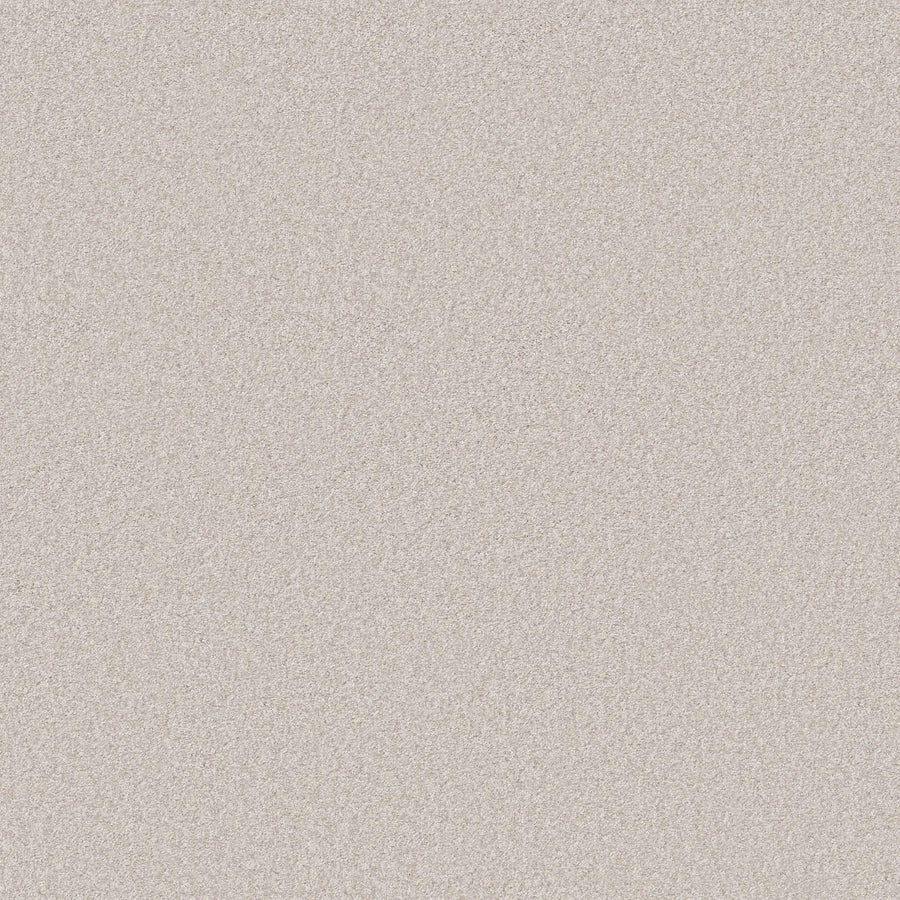 A close-up of the You Got This III Pet Friendly Carpet in White Cap reveals a smooth, light beige surface with a fine, even texture, offering modern elegance and comfort ideal for stylish flooring.