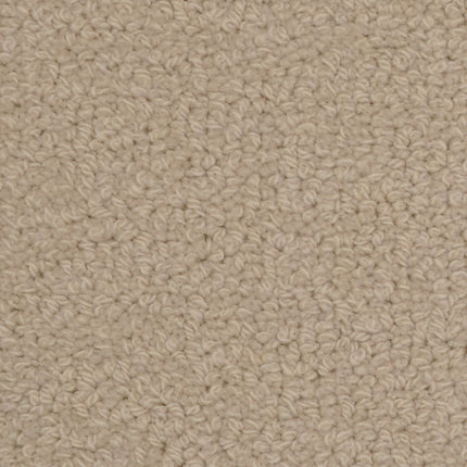Close-up of Savant Berber Carpet in Wiggins color, featuring tightly looped fibers for a uniform, soft surface. Its small, durable loops make it perfect for high-traffic areas while keeping a sturdy and cozy appearance.
