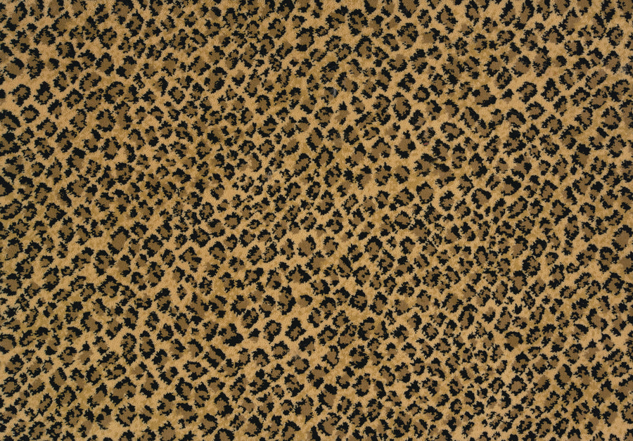 Close-up of Serengeti On Trend Carpet in Wildroot, featuring a leopard-inspired pattern with irregular black spots on a golden-brown base. This contemporary flooring brings bold sophistication and lasting performance to any space.