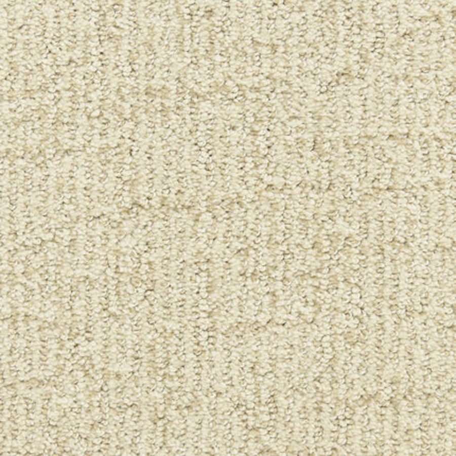 Close-up view of Victor Family Friendly Carpet in Windfall, featuring a beige looped pile pattern with a grid-like textured surface. This soft yet durable carpet offers uniform color and premium flooring for families.